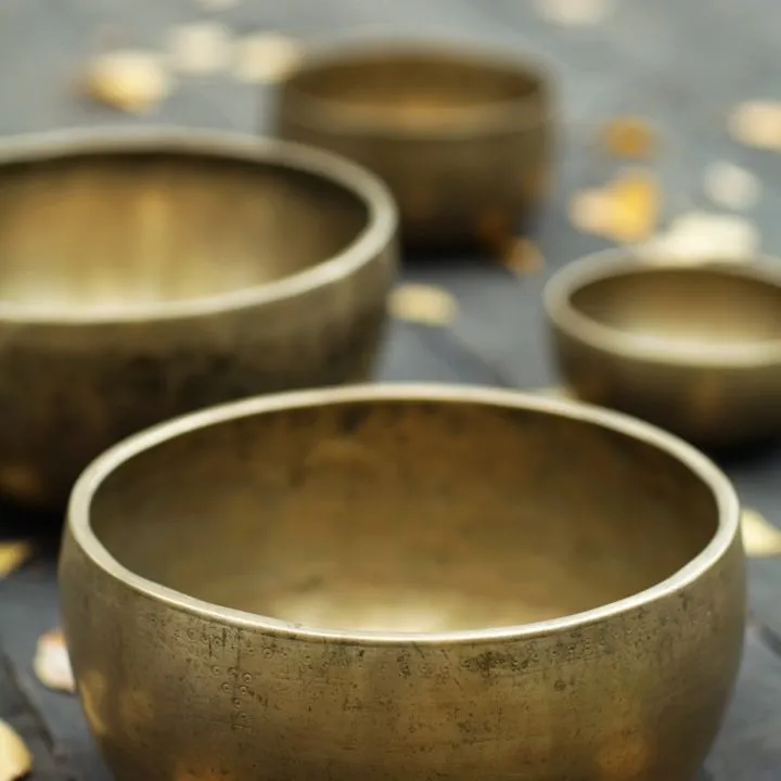 A quiet wellness space with warm massage bowls